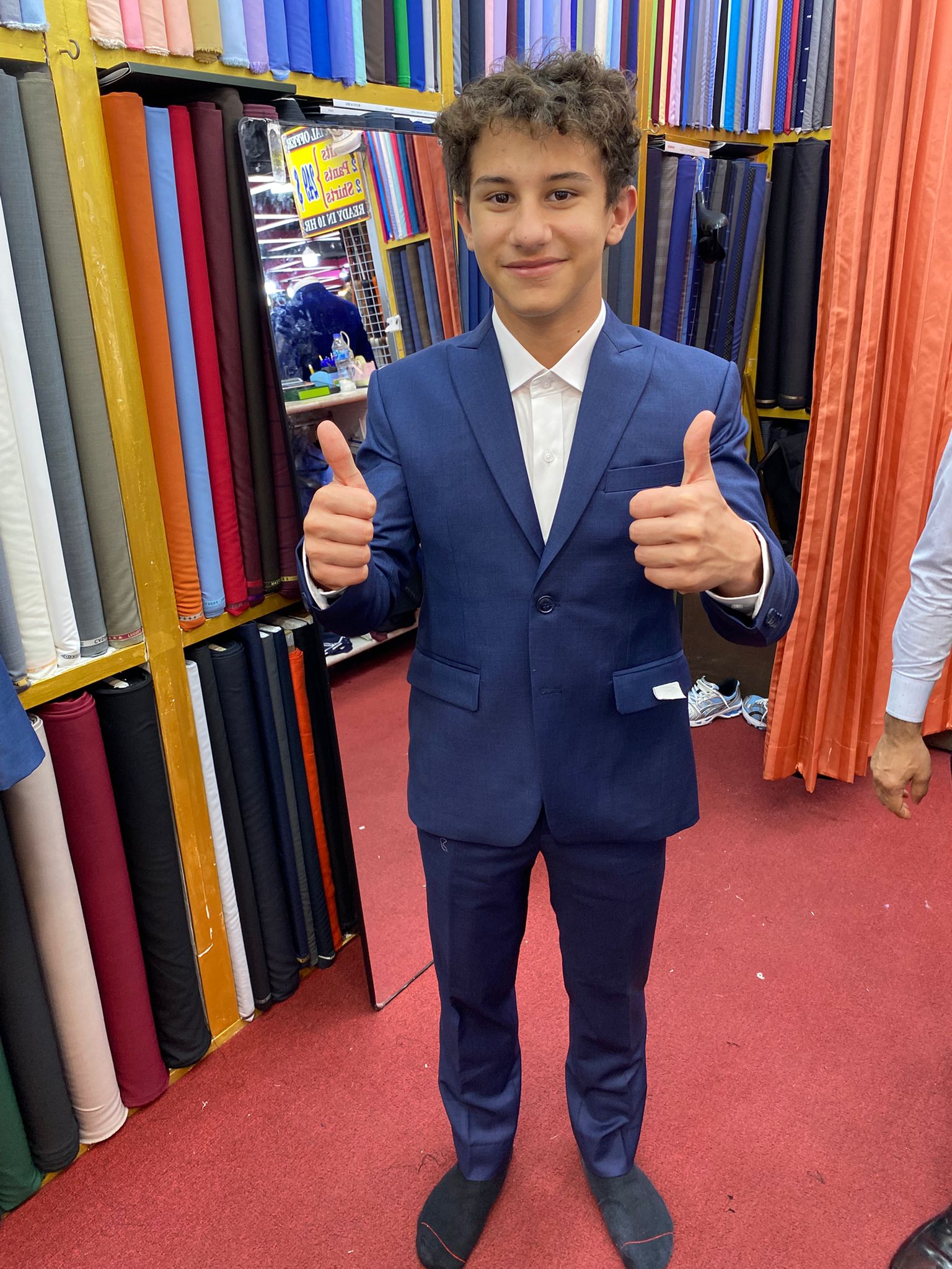 Happy client in custom tailored suit at King Fashion Uni Bangkok